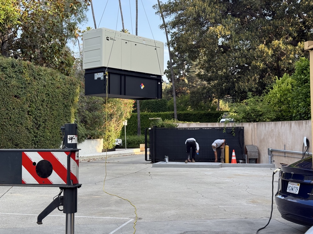 Cummins generator crane lift installation for backup power by Burlingame Brothers Electric